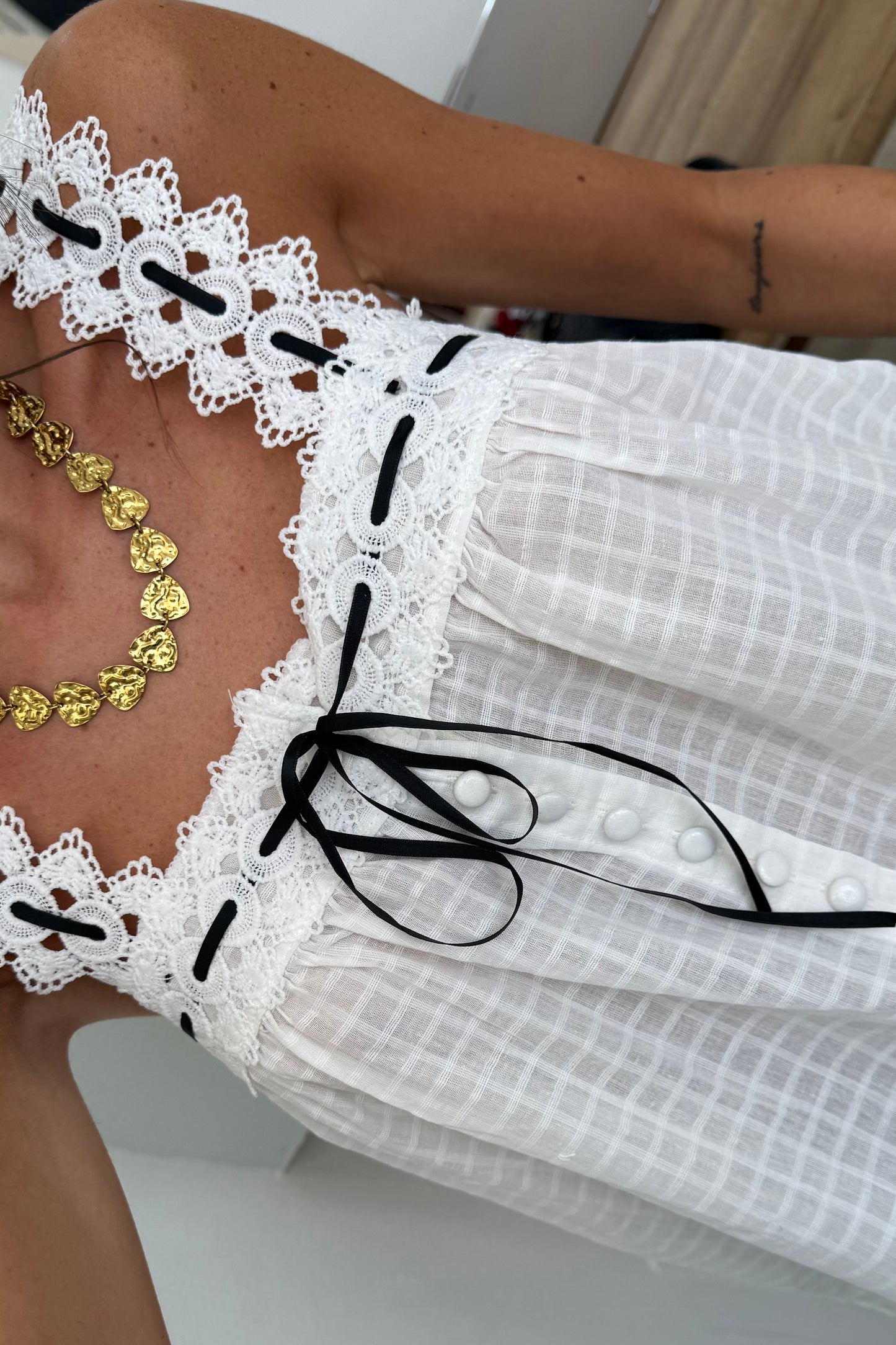 Embroidered Top With a Satin Bow
