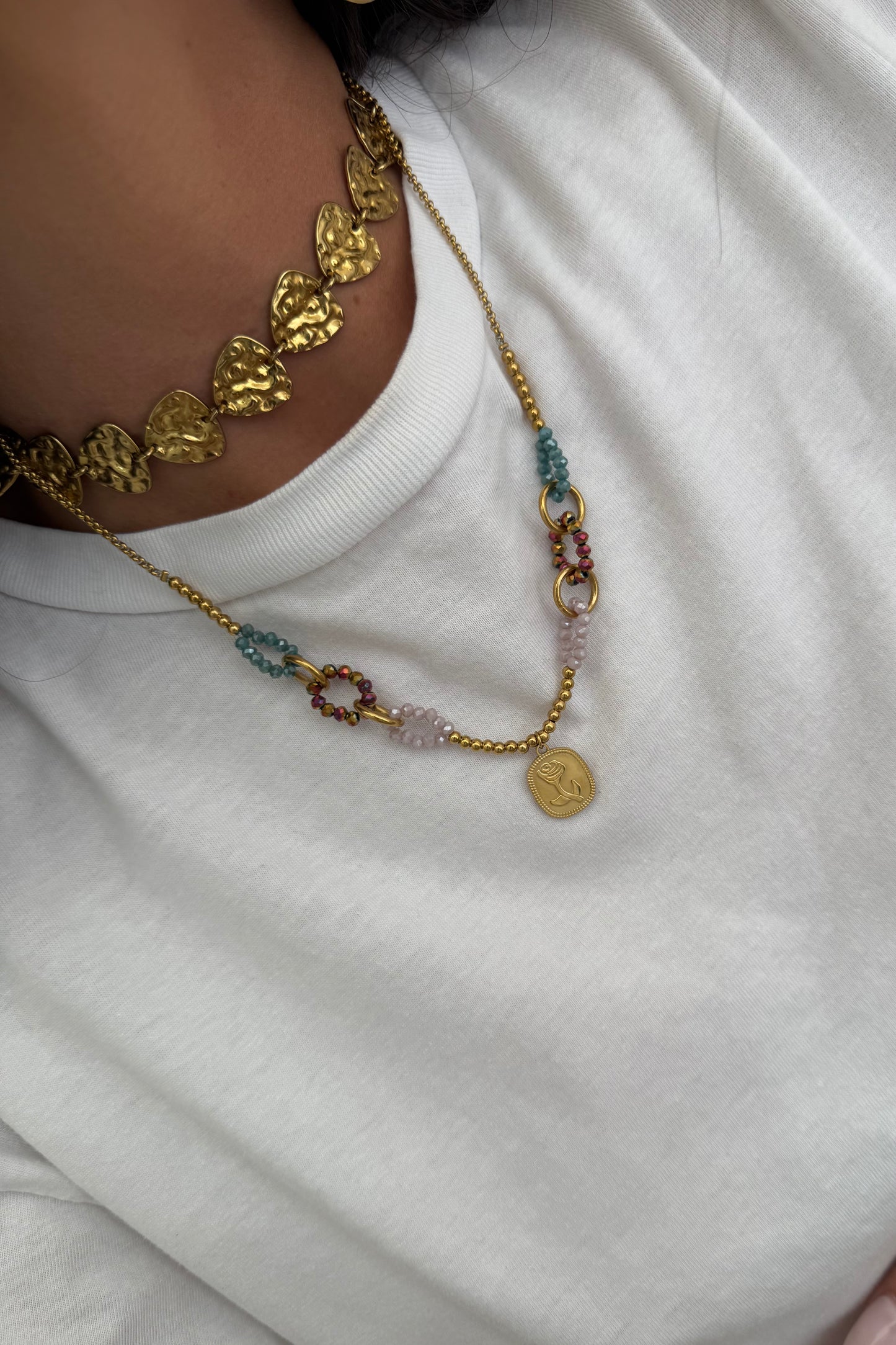 Necklace featuring a rose pendant