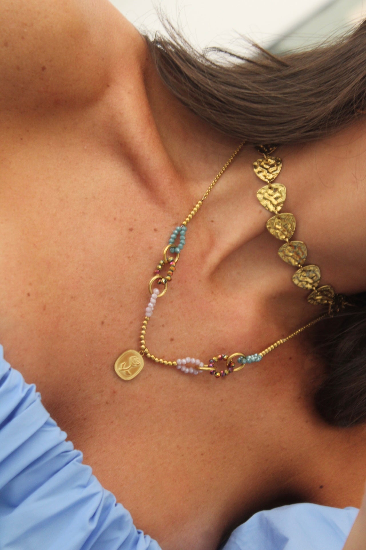 Necklace featuring a rose pendant