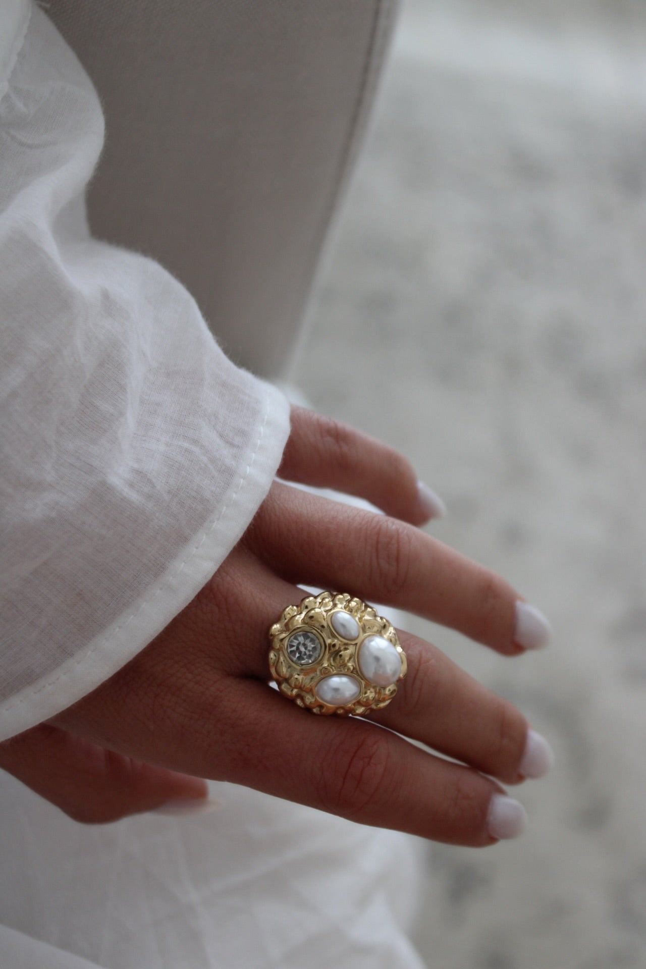 Ring with pearls and cubic zirconia