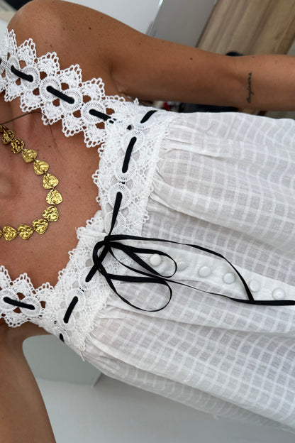 Embroidered Top With a Satin Bow