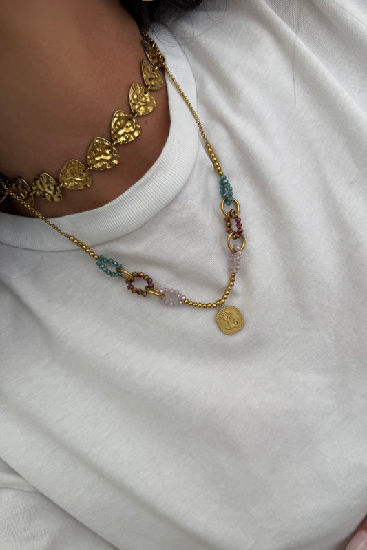 Necklace featuring a rose pendant