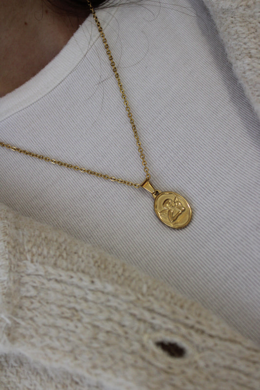 Necklace With Oval Medal